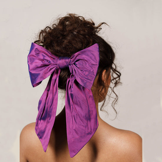 large purple hair bow