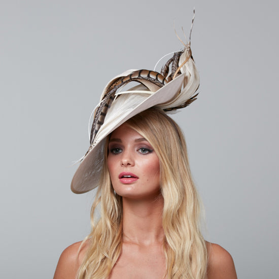 wide brim hat with feathers